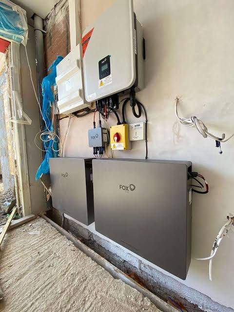 Inverter with modular stacked battery units